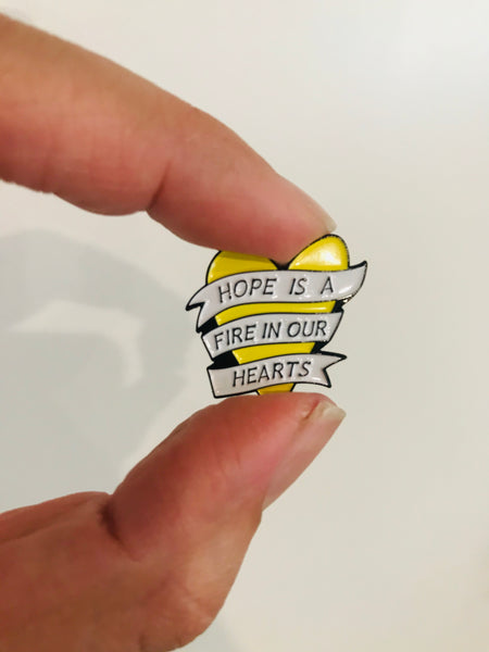Hope is a fire in our hearts Enamel Pin