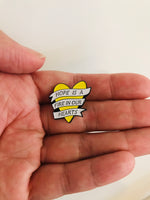 Hope is a fire in our hearts Enamel Pin